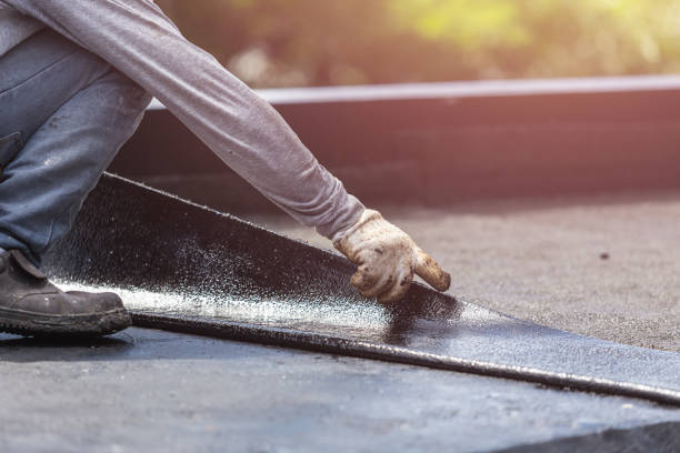 Professional Basement Waterproofing technician working in Westphalia, MI
